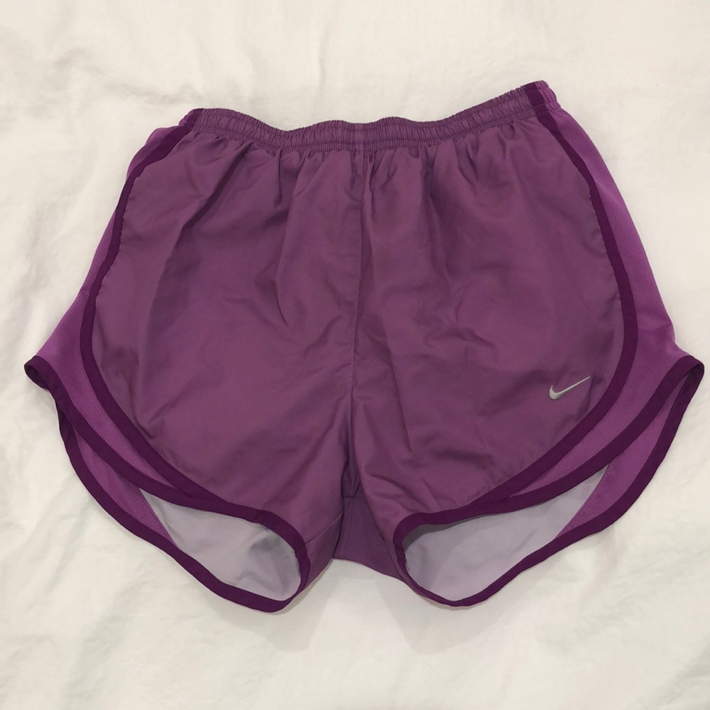 Purple Nike running shorts
